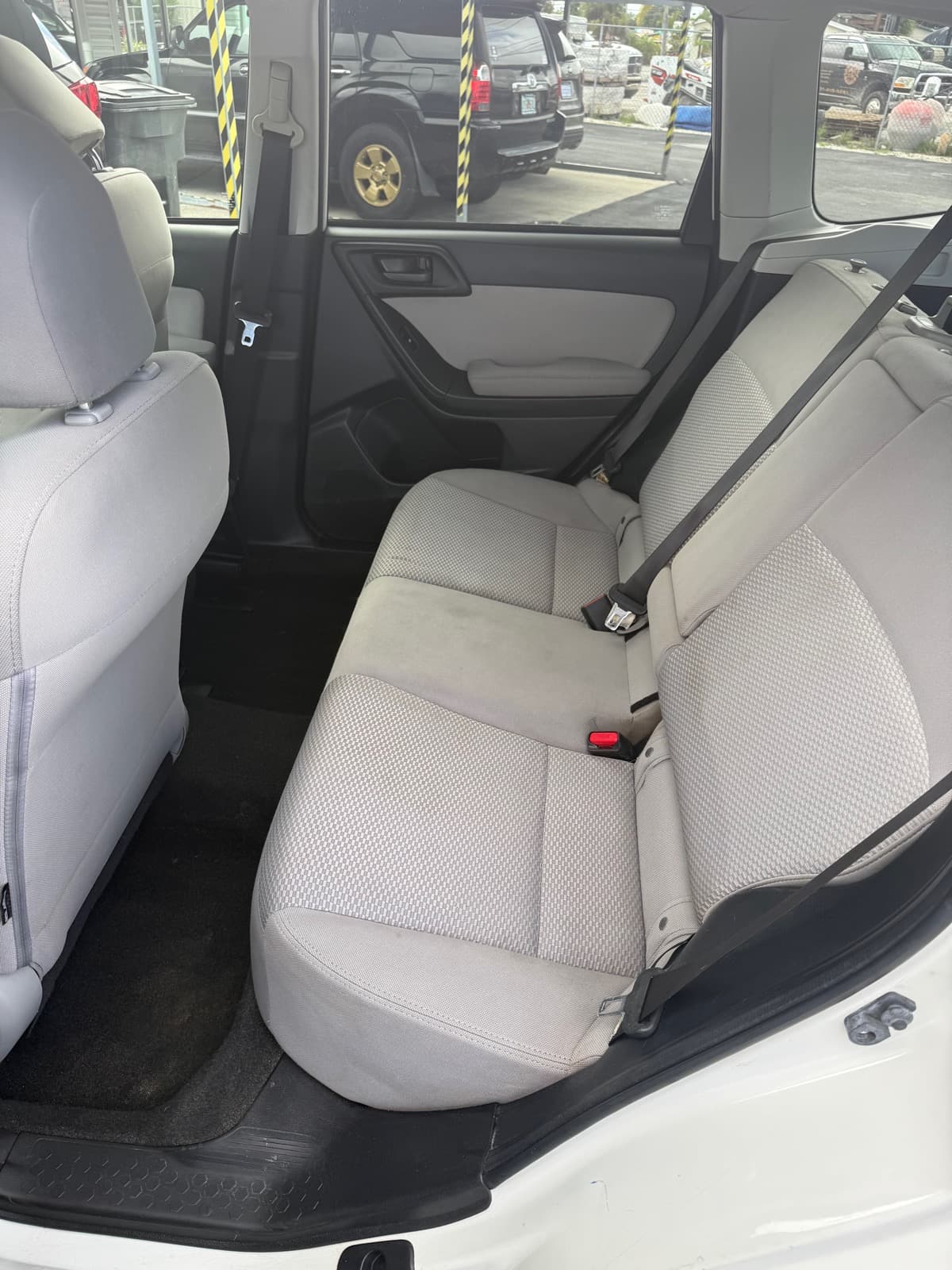 Vehicle rear seat after extraction and deep cleaning