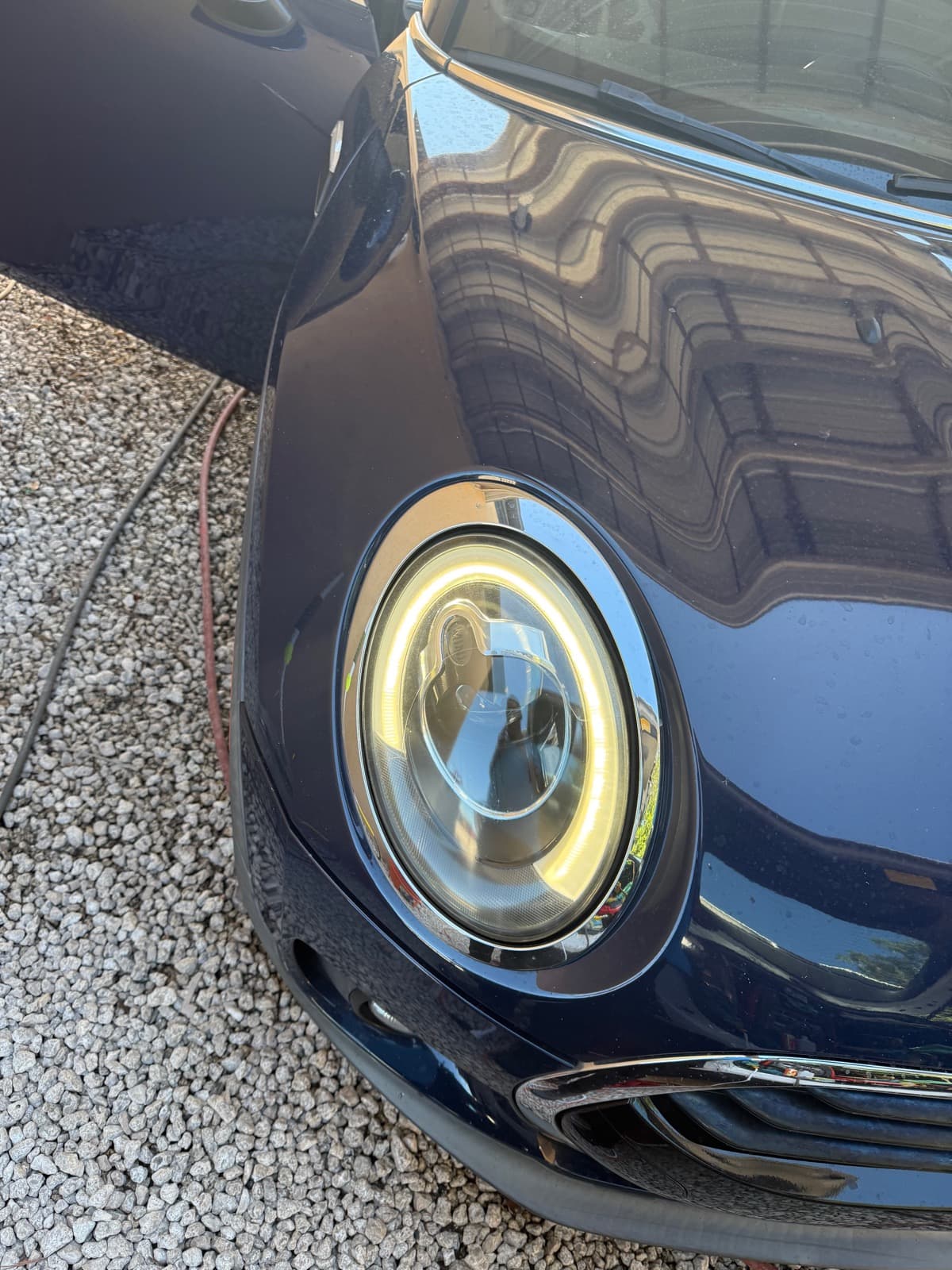 Headlight after restoration showing improved clarity