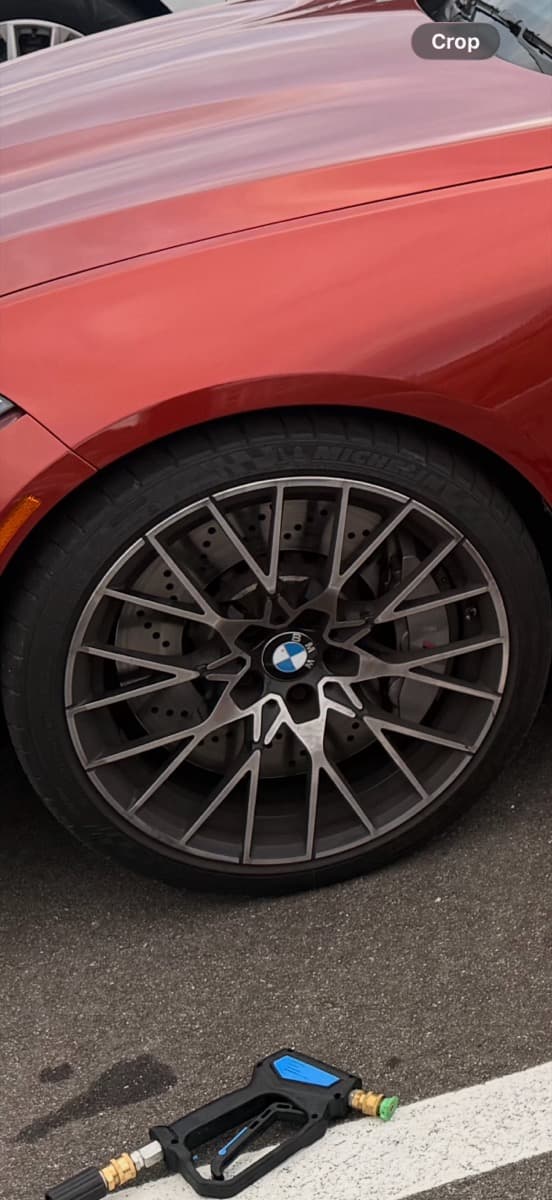 Wheel before cleaning showing brake dust buildup